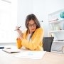 businesswoman-analysing-document-P8WSNMC-90x90